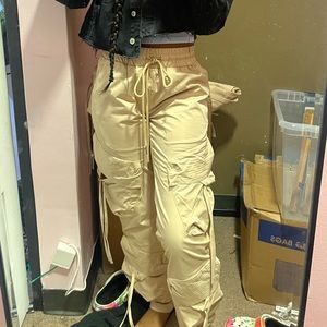 Tan joggers with strings and pockets